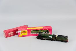 A Hornby Dublo two rail 2221 Castle Class BR Cardiff Castle (boxed) and a 4025 suburban coach (