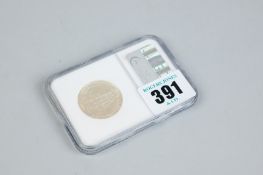 A 1910 Edward VII 925 silver florin in near un-circulated condition (plastic capsuled)