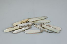 Fruit knives - a collection of eleven attractive mother of pearl mounted silver bladed fruit knives,
