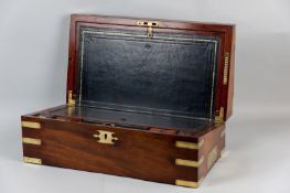 A good quality early 19th Century mahogany and brass bound campaign writing slope, the brass