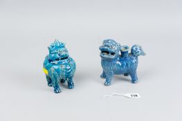 Two Chinese censers depicting four legged animals, one with open tail and mouth with incense