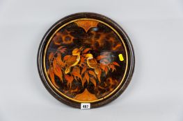 An Australian wooden dished tray with bentwood gilt decorated inner ring and hand painted and
