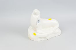 A rare Wedgwood model of a seal on a rocky base, the whole in a satin gloss finish, impressed