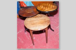 Three circular topped Victorian and later side tables, a mahogany and mixed wood segmented