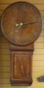 An nineteenth century tavern or 'Act of Parliament' mahogany wall-clock with unusual wooden dial and
