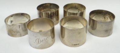 Six silver napkin rings of plain form, inscribed, 6.8ozs