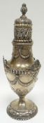 A silver baluster sugar-caster raised on a circular foot and profusely decorated in the Rococo-taste