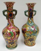 A pair of Continental bottle-vases decorated in the Chinese-export style with gilded ground,