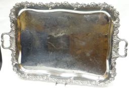 A heavy quality EPNS twin-handled tray with fruit-on-vine border and bright-cut floral interior,