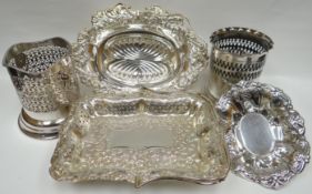 Two EPNS baskets, an EPNS dish and three EPNS pierce-work wine holders