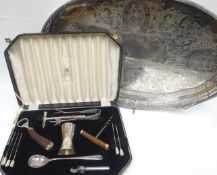 An EPNS pierce-work twin-handled galleried oval tray and a cased set of Viners Ltd cocktail-making