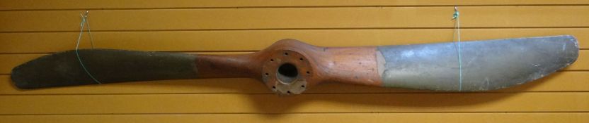 A twin-bladed Hispano-Suiza 200HP wooden aviation propeller, with eight bolt-holes to the hub,