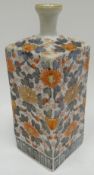 A believed to be early eighteenth century Japanese square based bottle vase, decorated profusely