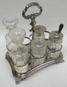 An early-Victorian silver seven-bottle cruet stand, the shaped platform on four scroll corner-