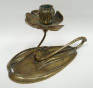 An Art Nouveau polished bronze candlestick holder by Georges De Feure in the naturalistic form of