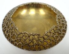 An Elizabeth II silver bowl with gilded naturalistic open-work lip, gilded interior and base, by