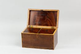 A Georgian mahogany tea caddy with rosewood crossbanding and boxwood stringing, twin mahogany lidded
