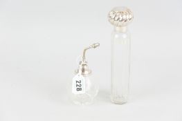 A globular etched glass cologne spray with silver collar and a glass dressing table/hat pin jar with