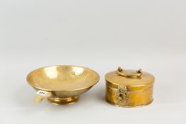 A hammered brass quaiche-type bowl, 25 cms diameter, and a round  Eastern brass container with