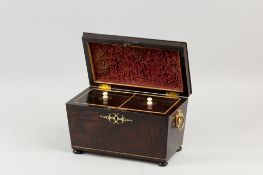 A 19th Century rosewood and ebony edged brass inlaid tea caddy with brass ring carrying handles