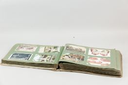 Post card album. A comprehensively filled post card album dated 1908 containing approx 500