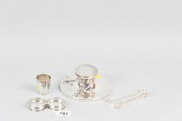 A circular silver inkwell, Birmingham 1905 (hinged lid damaged and impact damage to body), a pair of