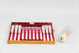 A cased set of six bone-handled bright cut fish knives and forks and an uncased set of six bone-