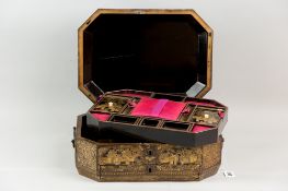 A Victorian Chinese export lacquer work box with metal carrying handles, typically decorated