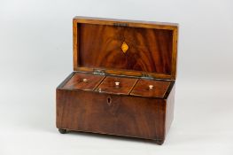 A Georgian mahogany and boxwood edged tea caddy with metal ring carrying handle on later brass