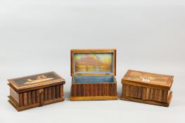 Three early twentieth century olive wood jewellery boxes of book form top and bottom with central