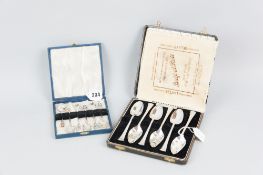 A cased set of six silver coffee spoons with attractive pierced diamond shaped harlequin enamel