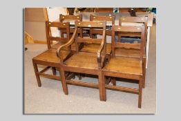 A set of six (five plus one carver) antique oak Anglesey farmhouse chairs with decoration by