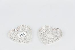 A pair of heart shaped silver dishes having raised lions masks, exotic birds and leaves etc, 2.4ozs,