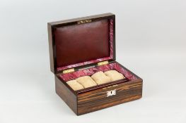 A Victorian coramandel jewellery box with mother of pearl cartouche and description, the lid opening