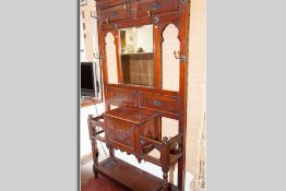 A good size Edwardian mahogany hallstand with carved chamfered panels, central bevelled edge