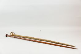 A Victorian sword stick, a good quality wooden shaft with metal tip and collar, the bladed top