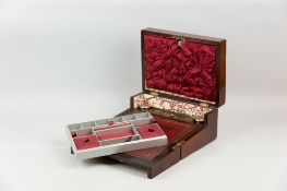 A 19th Century rosewood combined jewellery box and writing slope, the top with mother of pearl and