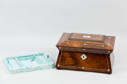 A good quality 19th Century rosewood jewellery box of sarcophagus form with flared base on turned