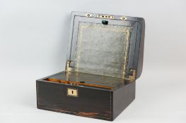 A Victorian semi-domed top Coromandel and brass strung writing slope with brass top plaque and