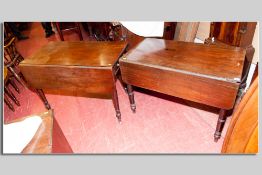 A Victorian mahogany drop leaf Pembroke table having an end opening drawer and an end false drawer
