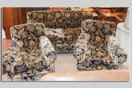 A good Art Deco three piece upholstered lounge suite comprising a two seater drop arm couch and pair