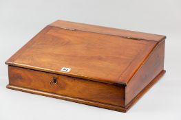 A Victorian mahogany desk top writing slope with lift-up hinged lid revealing two interior
