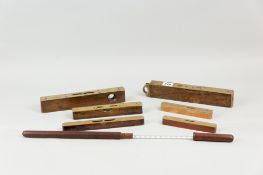 A collection of brass topped and wooden spirit levels by Rabone, Marples, Smallwood etc, various