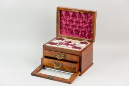 A good quality 19th Century walnut lady's travelling box with inset carrying handle, the slightly