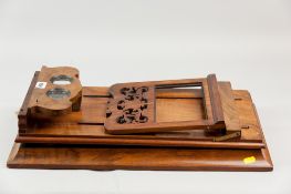 A large Victorian walnut tabletop stereoscopic viewer with adjustable wooden fretwork ratchet