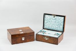 A Victorian figured walnut lidded sewing box with mother of pearl cartouche and escutcheon, the