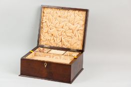 A Victorian mahogany lidded jewellery box with bone escutcheon, the lid inlaid with multi-wood cubic