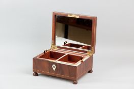 A good quality mahogany jewellery box with boxwood stringing and ivory escutcheon on raised bun