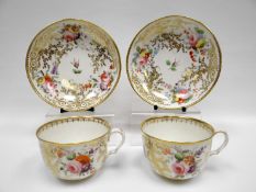 SWANSEA porcelain - pair of tea cups and saucers, the cups with ear shaped loop handles, with all