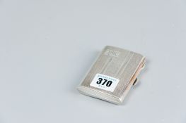 A lady's engine turned silver cigarette case, 2.2 ozs, Birmingham 1930